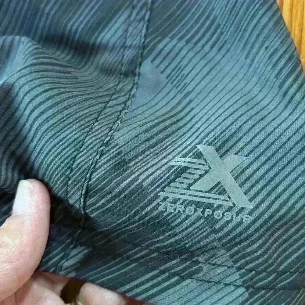 2 Pairs Of Men's Swim Trunks... ZX... ZeroXposur Size Large